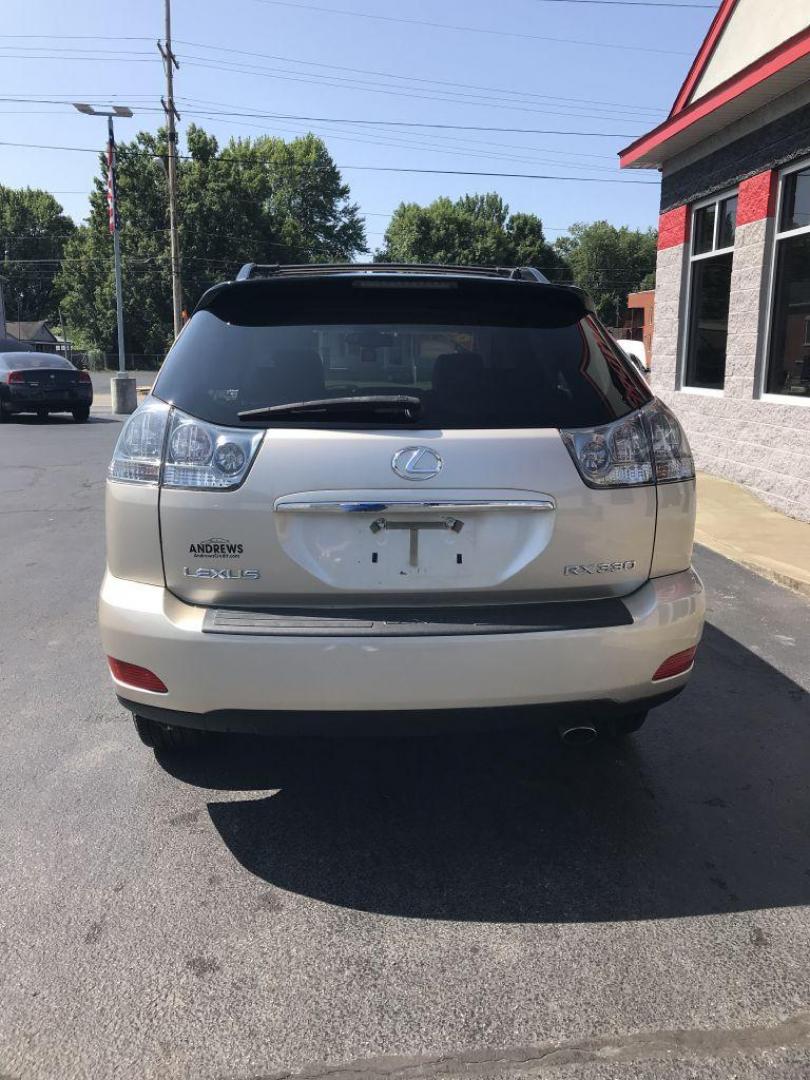 2004 GOLD LEXUS RX330 330 (JTJHA31U640) with an 3.3L engine, Automatic transmission, located at 3100 Covert Avenue, Evansville, IN, 47714, (812) 473-4492, 37.955418, -87.512238 - Photo#2