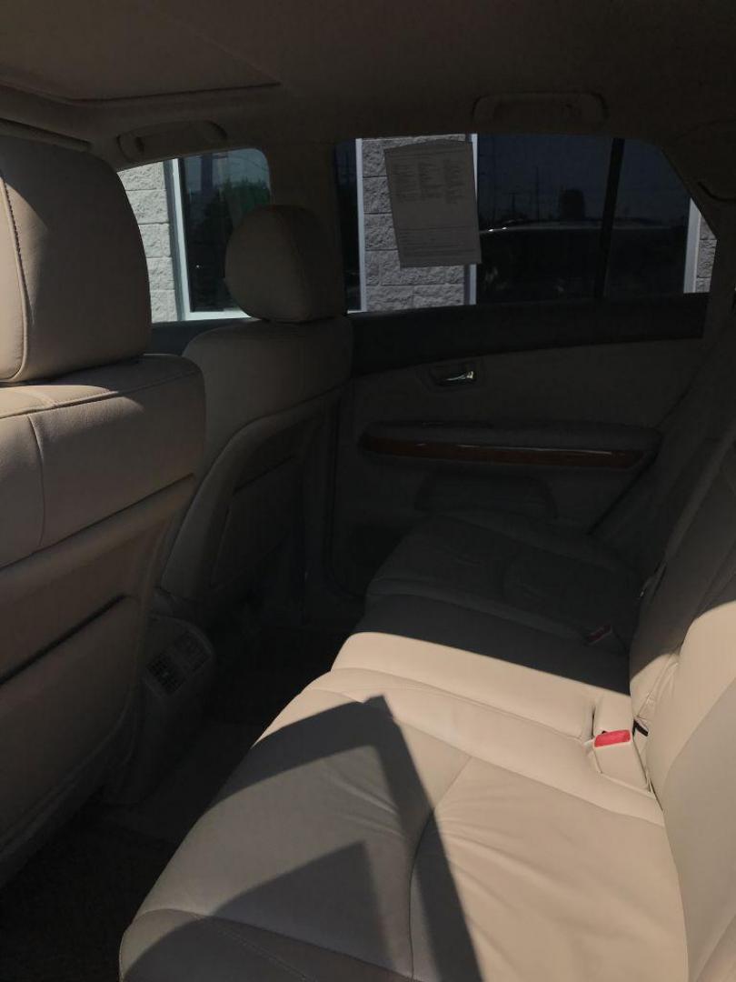 2004 GOLD LEXUS RX330 330 (JTJHA31U640) with an 3.3L engine, Automatic transmission, located at 3100 Covert Avenue, Evansville, IN, 47714, (812) 473-4492, 37.955418, -87.512238 - Photo#4