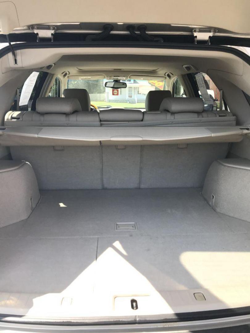 2004 GOLD LEXUS RX330 330 (JTJHA31U640) with an 3.3L engine, Automatic transmission, located at 3100 Covert Avenue, Evansville, IN, 47714, (812) 473-4492, 37.955418, -87.512238 - Photo#6