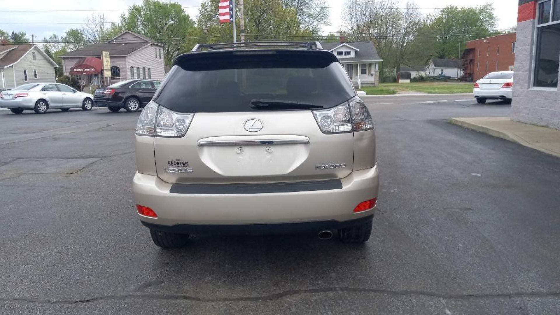 2004 GOLD LEXUS RX330 330 (JTJHA31U640) with an 3.3L engine, Automatic transmission, located at 3100 Covert Avenue, Evansville, IN, 47714, (812) 473-4492, 37.955418, -87.512238 - Photo#10