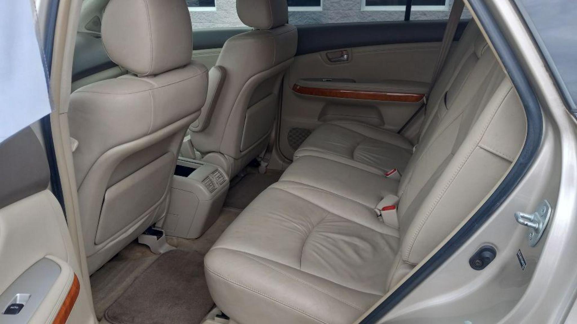 2004 GOLD LEXUS RX330 330 (JTJHA31U640) with an 3.3L engine, Automatic transmission, located at 3100 Covert Avenue, Evansville, IN, 47714, (812) 473-4492, 37.955418, -87.512238 - Photo#12