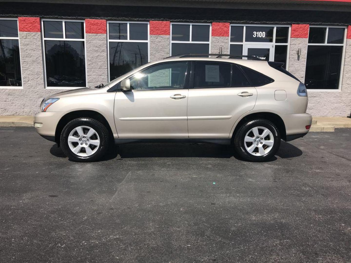 2004 GOLD LEXUS RX330 330 (JTJHA31U640) with an 3.3L engine, Automatic transmission, located at 3100 Covert Avenue, Evansville, IN, 47714, (812) 473-4492, 37.955418, -87.512238 - Photo#0