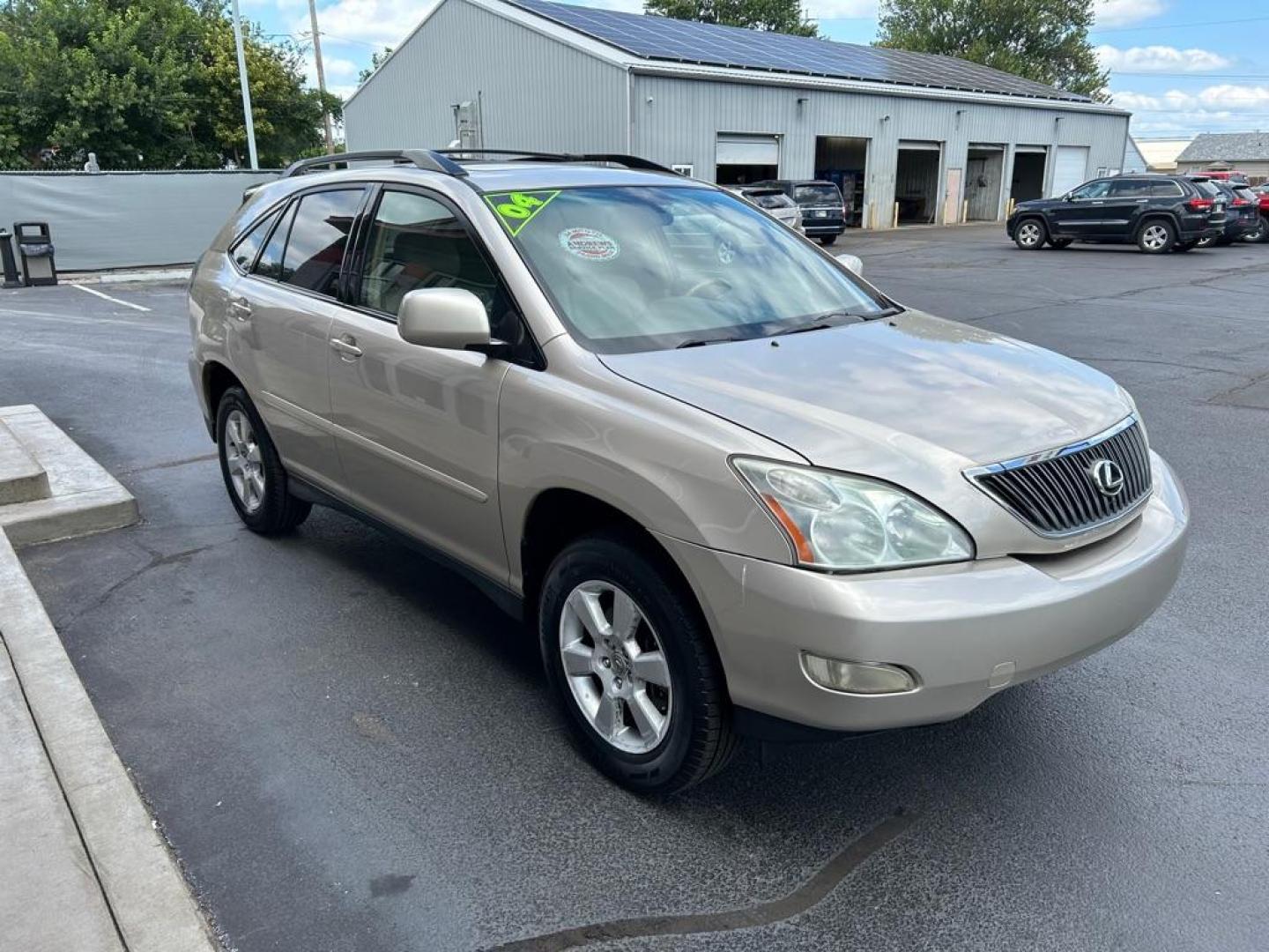 2004 GOLD LEXUS RX330 330 (JTJHA31U640) with an 3.3L engine, Automatic transmission, located at 3100 Covert Avenue, Evansville, IN, 47714, (812) 473-4492, 37.955418, -87.512238 - Photo#15