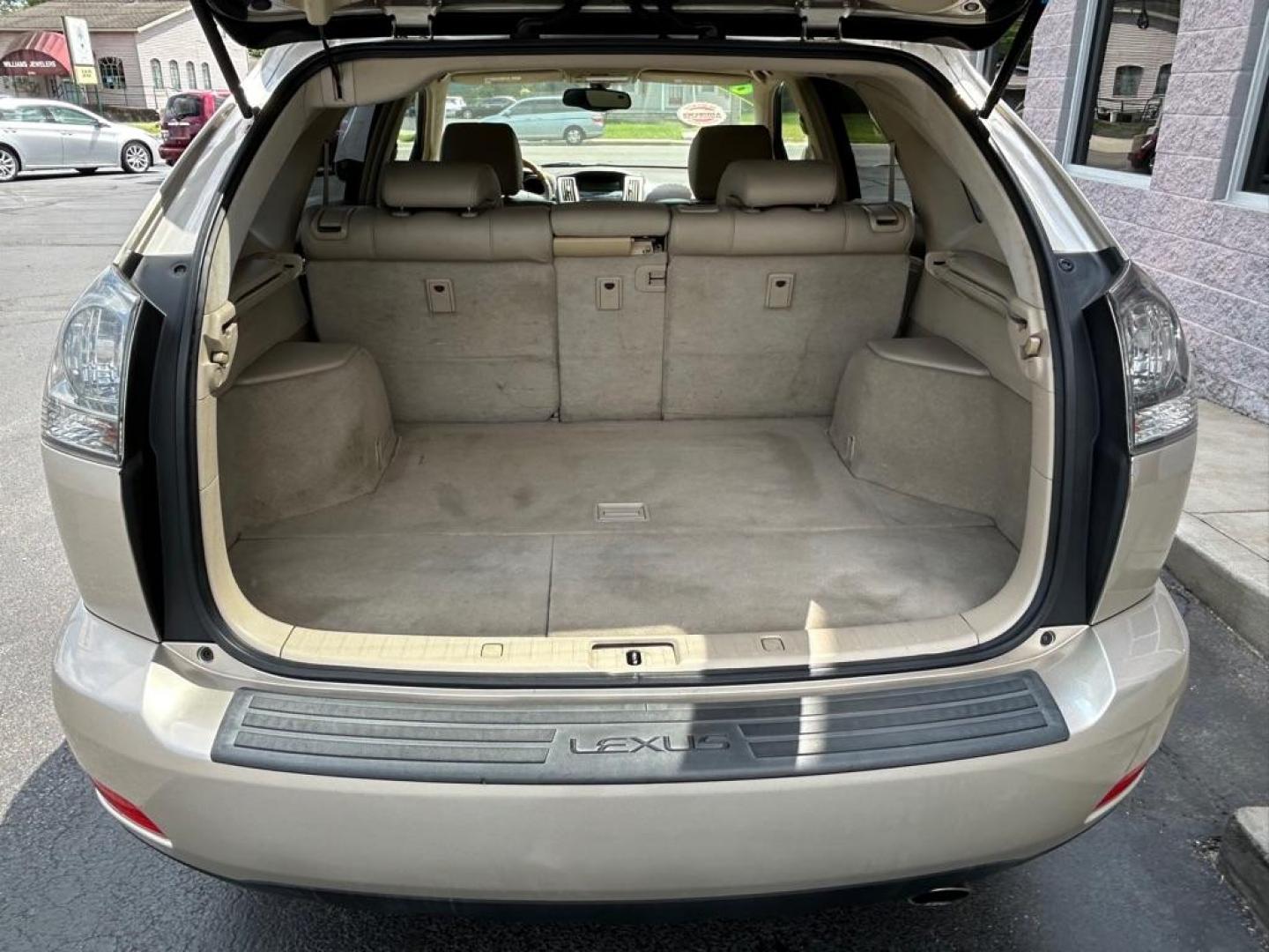 2004 GOLD LEXUS RX330 330 (JTJHA31U640) with an 3.3L engine, Automatic transmission, located at 3100 Covert Avenue, Evansville, IN, 47714, (812) 473-4492, 37.955418, -87.512238 - Photo#17