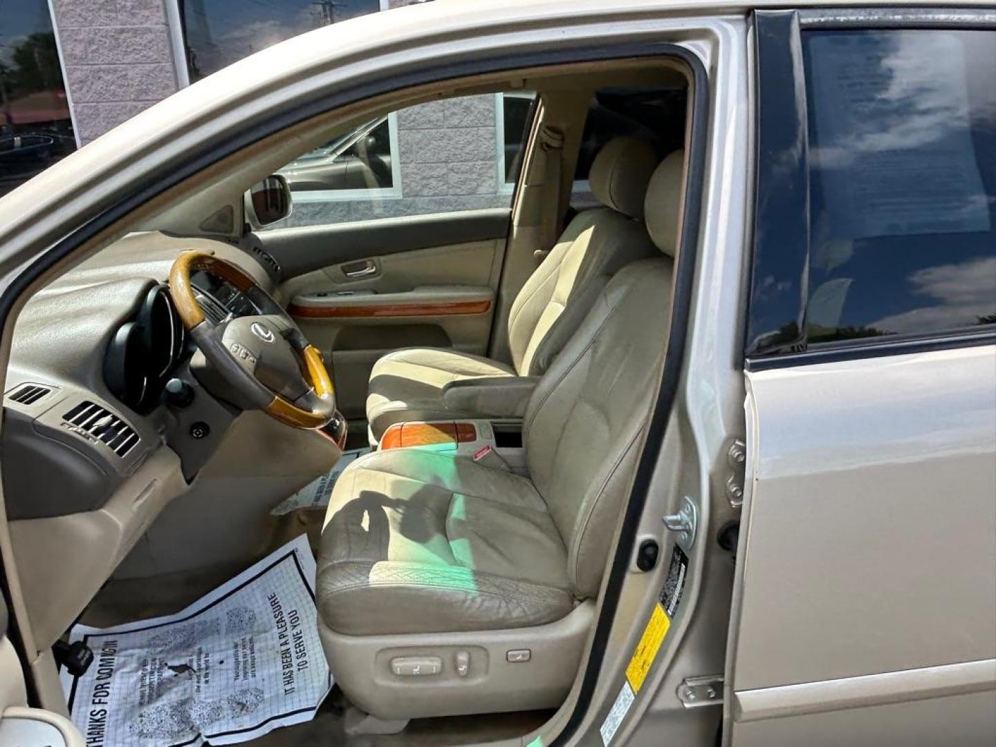 2004 GOLD LEXUS RX330 330 (JTJHA31U640) with an 3.3L engine, Automatic transmission, located at 3100 Covert Avenue, Evansville, IN, 47714, (812) 473-4492, 37.955418, -87.512238 - Photo#18