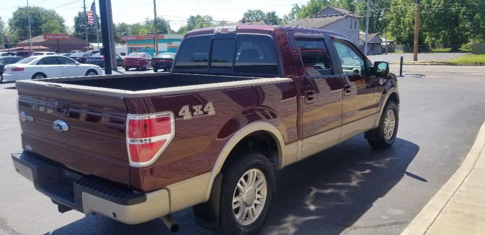 2009 MAROON FORD F150 KING RANCH SUPERCREW (1FTPW14V59K) with an 5.4L engine, Automatic transmission, located at 3100 Covert Avenue, Evansville, IN, 47714, (812) 473-4492, 37.955418, -87.512238 - Photo#4