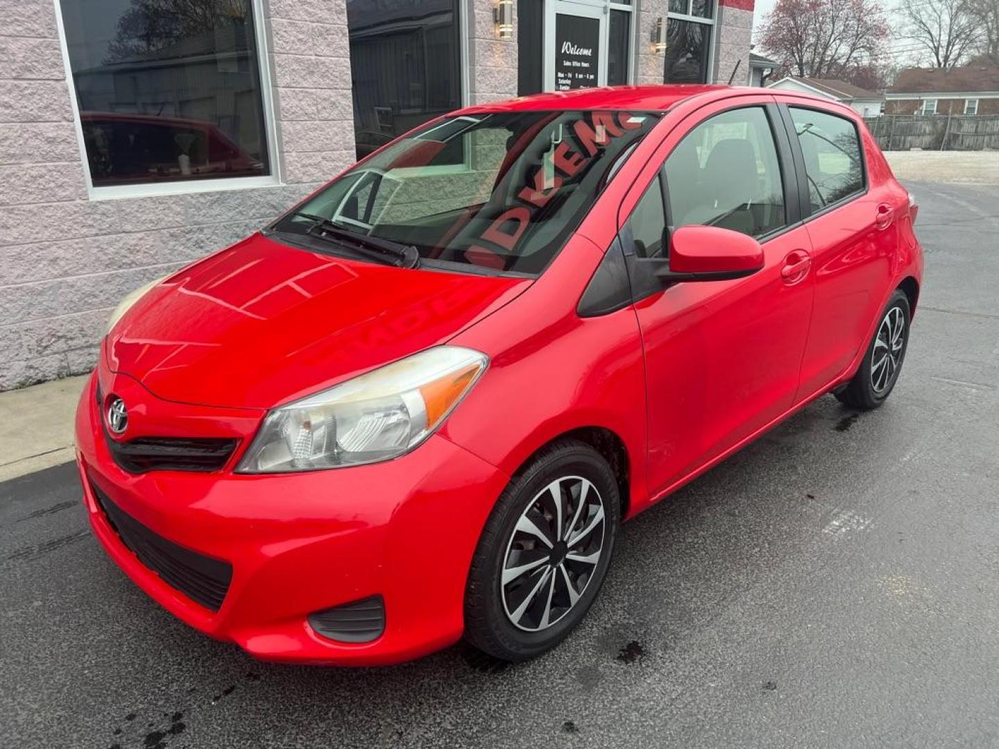 2014 RED TOYOTA YARIS (JTDKTUD30ED) with an 1.5L engine, Automatic transmission, located at 3100 Covert Avenue, Evansville, IN, 47714, (812) 473-4492, 37.955418, -87.512238 - Photo#2
