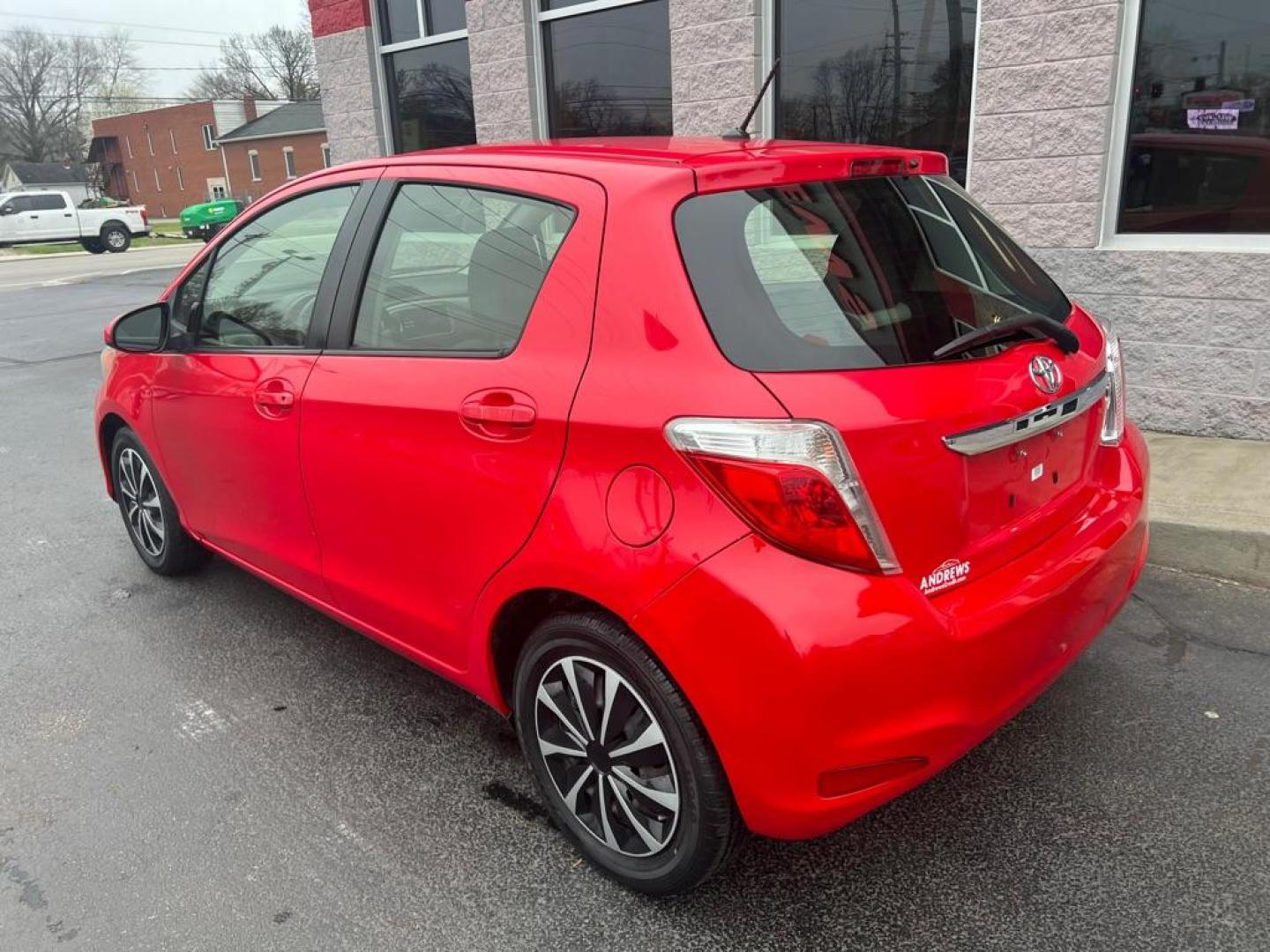 2014 RED TOYOTA YARIS (JTDKTUD30ED) with an 1.5L engine, Automatic transmission, located at 3100 Covert Avenue, Evansville, IN, 47714, (812) 473-4492, 37.955418, -87.512238 - Photo#3
