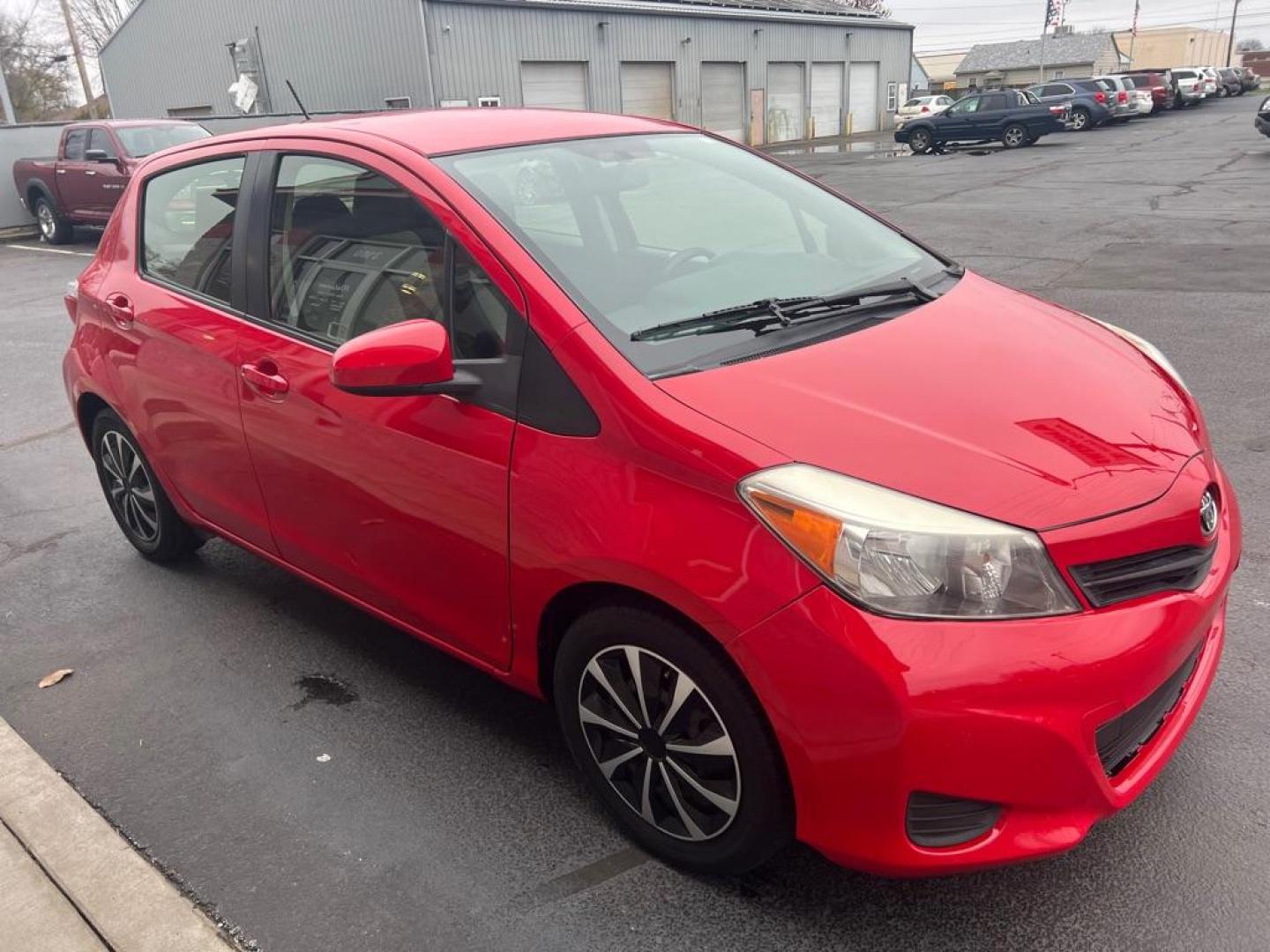 2014 RED TOYOTA YARIS (JTDKTUD30ED) with an 1.5L engine, Automatic transmission, located at 3100 Covert Avenue, Evansville, IN, 47714, (812) 473-4492, 37.955418, -87.512238 - Photo#6