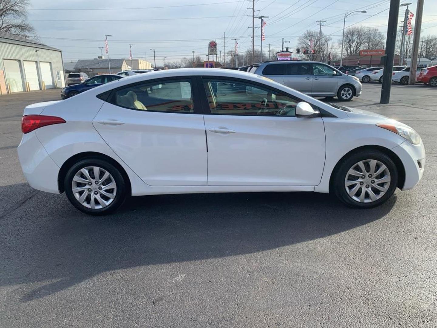 2011 WHITE HYUNDAI ELANTRA GLS (5NPDH4AE5BH) with an 1.8L engine, Automatic transmission, located at 3100 Covert Avenue, Evansville, IN, 47714, (812) 473-4492, 37.955418, -87.512238 - Photo#2