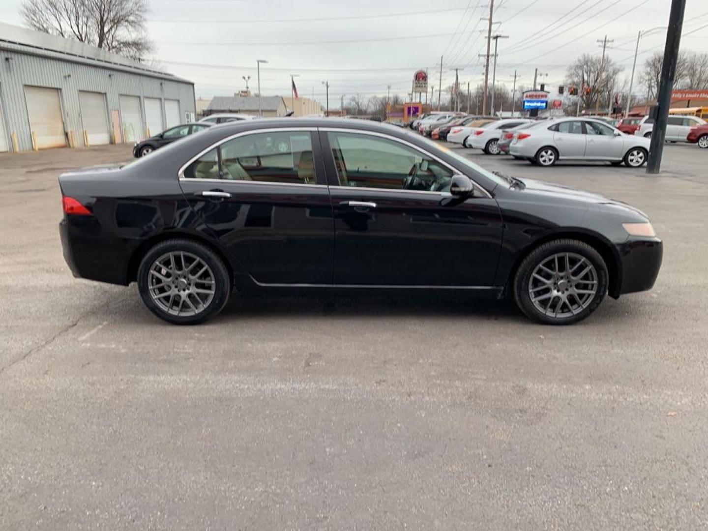 2005 BLACK ACURA TSX (JH4CL96845C) with an 2.4L engine, Automatic transmission, located at 3100 Covert Avenue, Evansville, IN, 47714, (812) 473-4492, 37.955418, -87.512238 - Photo#2