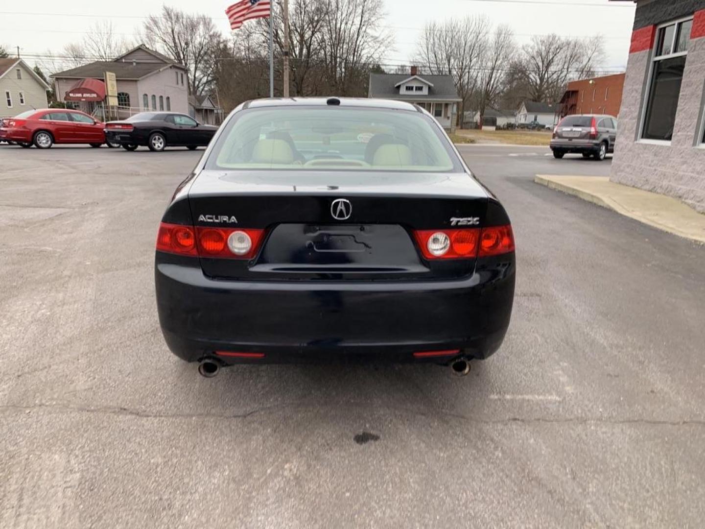 2005 BLACK ACURA TSX (JH4CL96845C) with an 2.4L engine, Automatic transmission, located at 3100 Covert Avenue, Evansville, IN, 47714, (812) 473-4492, 37.955418, -87.512238 - Photo#3