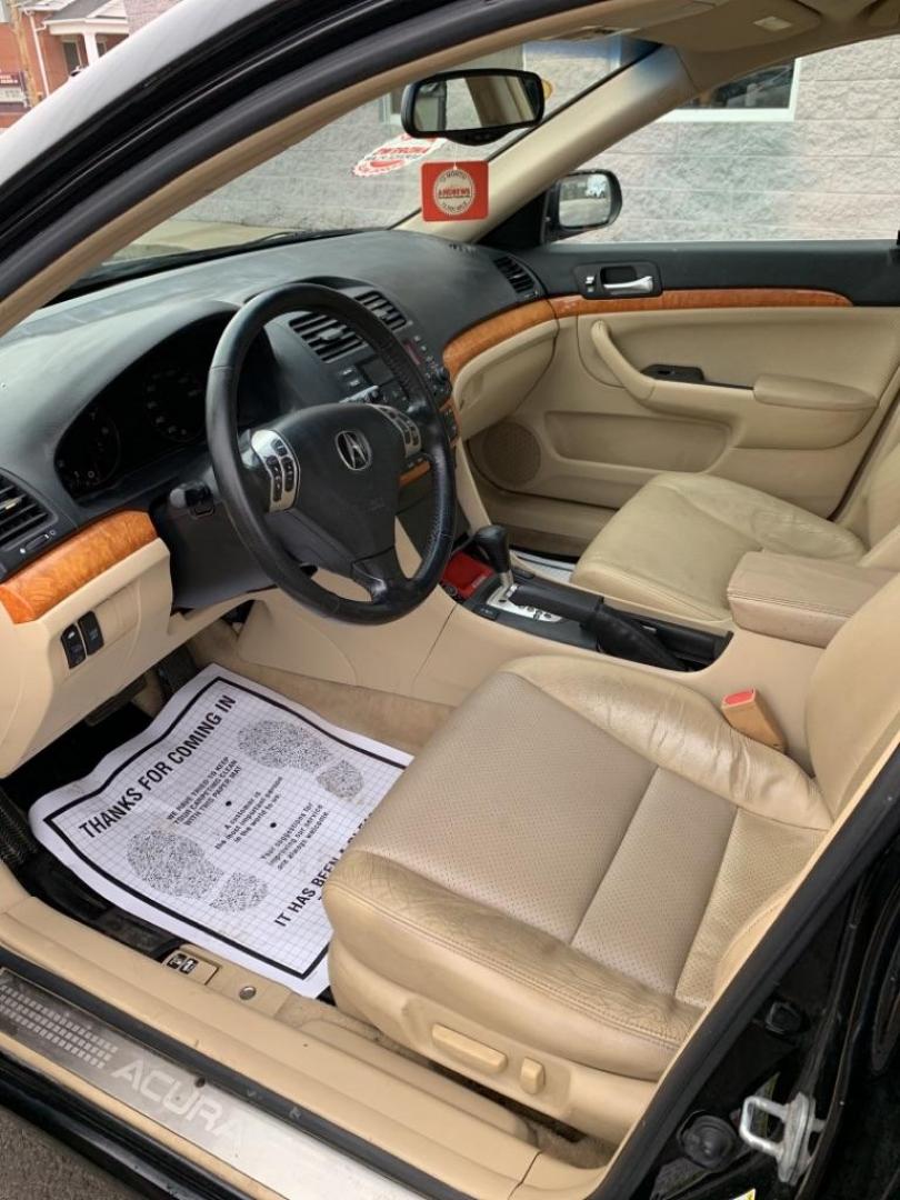 2005 BLACK ACURA TSX (JH4CL96845C) with an 2.4L engine, Automatic transmission, located at 3100 Covert Avenue, Evansville, IN, 47714, (812) 473-4492, 37.955418, -87.512238 - Photo#4