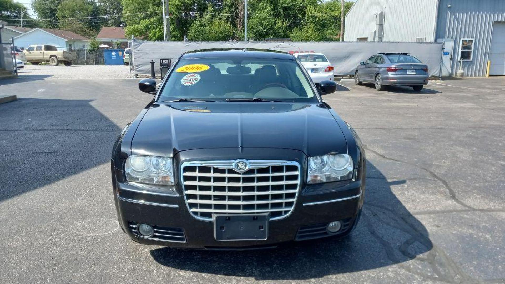 2006 BLACK CHRYSLER 300 TOURING (2C3LA53G06H) with an 3.5L engine, Automatic transmission, located at 3100 Covert Avenue, Evansville, IN, 47714, (812) 473-4492, 37.955418, -87.512238 - Photo#1