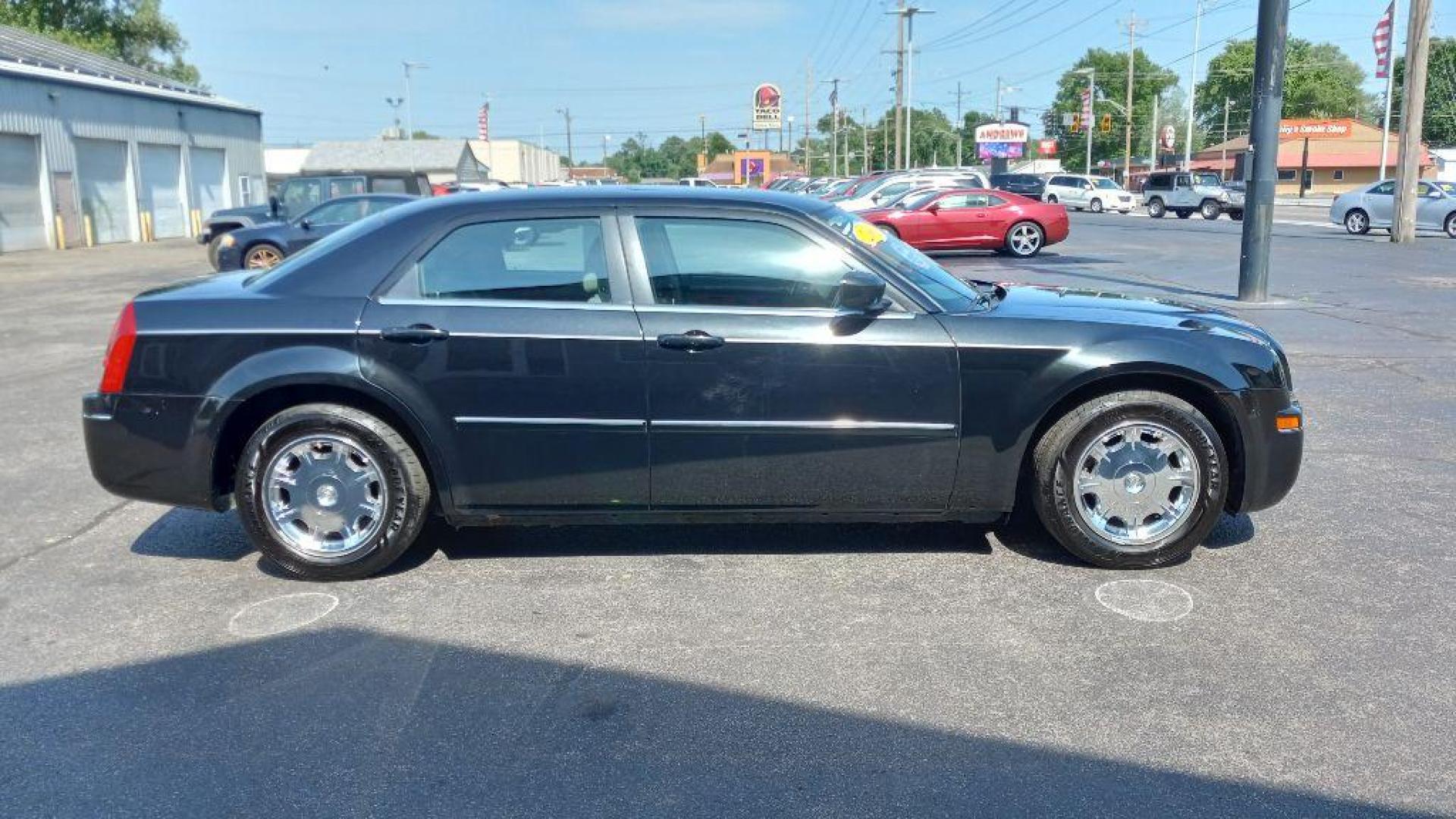 2006 BLACK CHRYSLER 300 TOURING (2C3LA53G06H) with an 3.5L engine, Automatic transmission, located at 3100 Covert Avenue, Evansville, IN, 47714, (812) 473-4492, 37.955418, -87.512238 - Photo#2