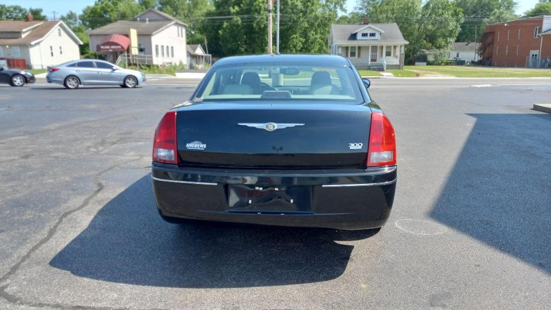 2006 BLACK CHRYSLER 300 TOURING (2C3LA53G06H) with an 3.5L engine, Automatic transmission, located at 3100 Covert Avenue, Evansville, IN, 47714, (812) 473-4492, 37.955418, -87.512238 - Photo#3