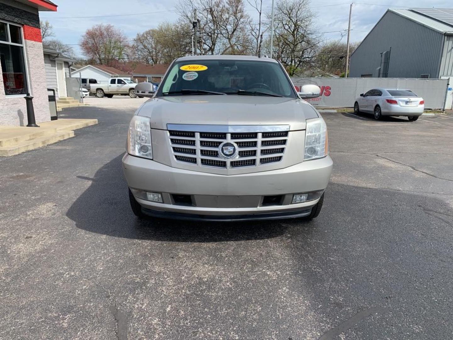 2007 GOLD CADILLAC ESCALADE ESV (1GYFK66887R) with an 6.2L engine, Automatic transmission, located at 3100 Covert Avenue, Evansville, IN, 47714, (812) 473-4492, 37.955418, -87.512238 - The ''Check Suspension'' light is on due to an electical error, the suspension is safely working. - Photo#1