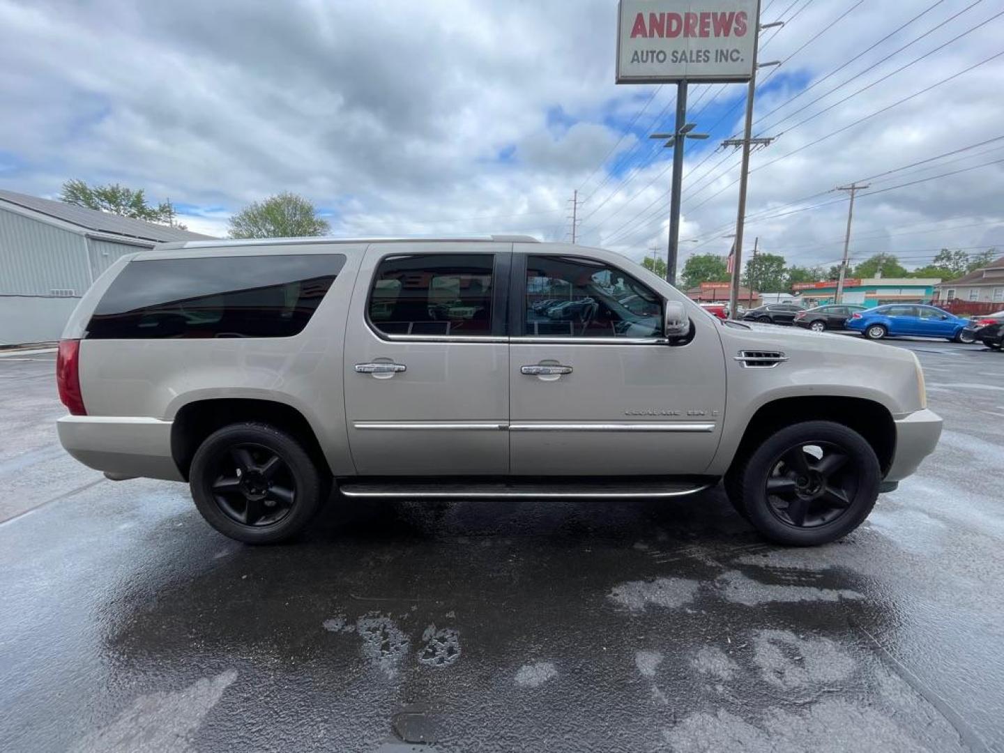 2007 GOLD CADILLAC ESCALADE ESV (1GYFK66887R) with an 6.2L engine, Automatic transmission, located at 3100 Covert Avenue, Evansville, IN, 47714, (812) 473-4492, 37.955418, -87.512238 - The ''Check Suspension'' light is on due to an electical error, the suspension is safely working. - Photo#2