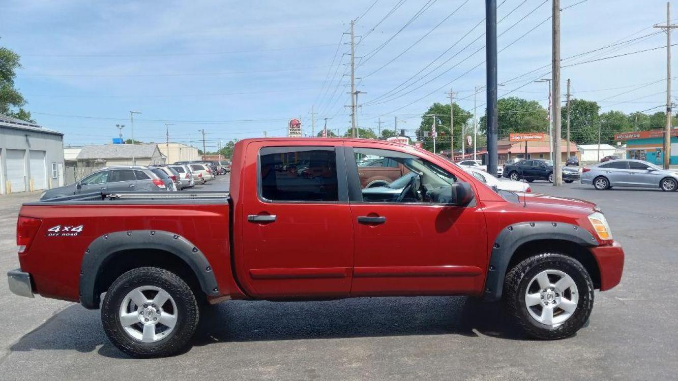 2004 RED NISSAN TITAN XE (1N6AA07BX4N) with an 5.6L engine, Automatic transmission, located at 3100 Covert Avenue, Evansville, IN, 47714, (812) 473-4492, 37.955418, -87.512238 - Photo #2