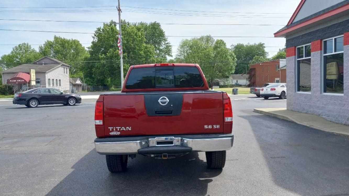 2004 RED NISSAN TITAN XE (1N6AA07BX4N) with an 5.6L engine, Automatic transmission, located at 3100 Covert Avenue, Evansville, IN, 47714, (812) 473-4492, 37.955418, -87.512238 - Photo #3