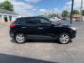 2012 BLACK HYUNDAI TUCSON GLS (KM8JUCAC8CU) with an 2.4L engine, Automatic transmission, located at 3100 Covert Avenue, Evansville, IN, 47714, (812) 473-4492, 37.955418, -87.512238 - Photo#2