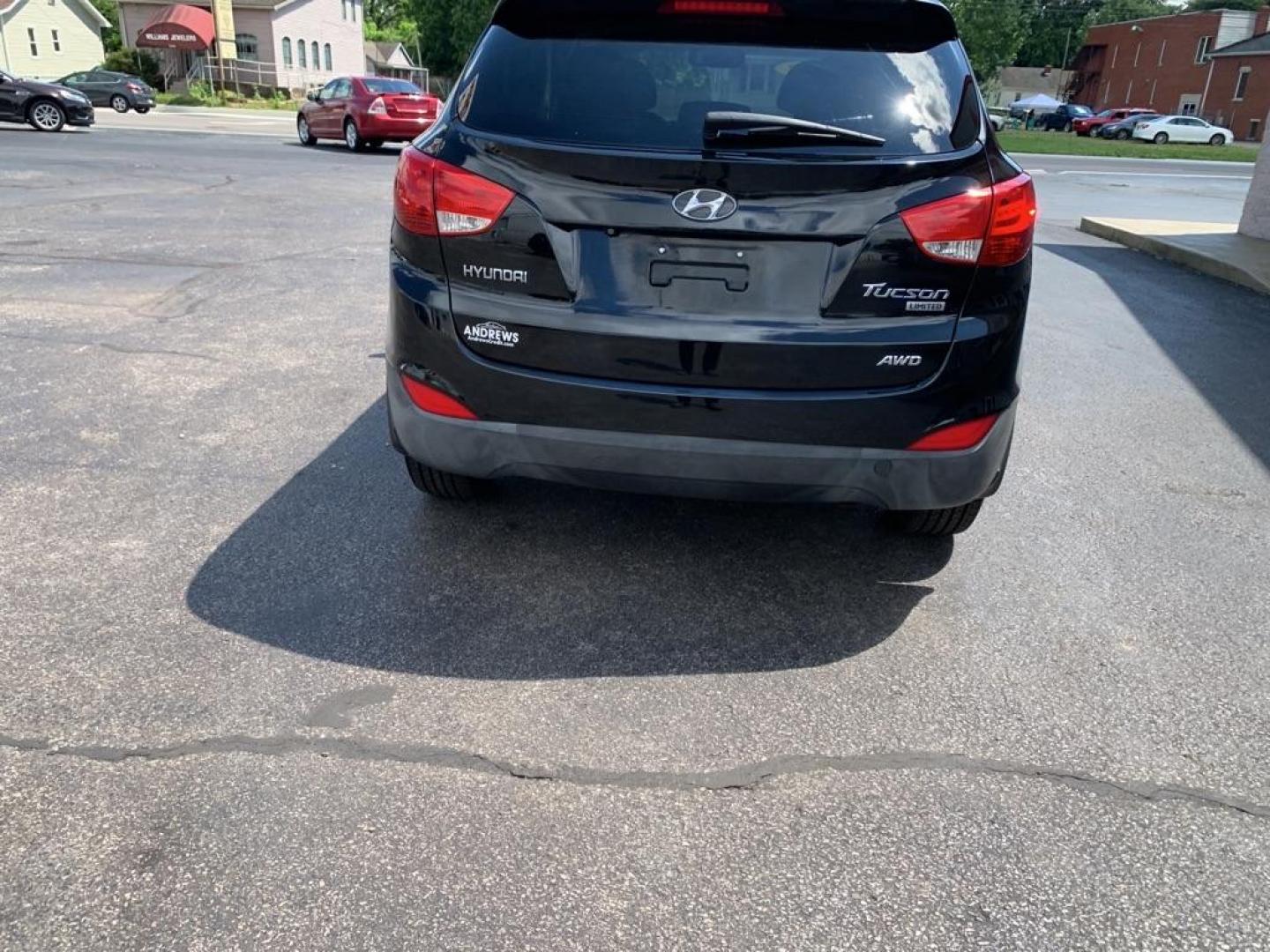 2012 BLACK HYUNDAI TUCSON GLS (KM8JUCAC8CU) with an 2.4L engine, Automatic transmission, located at 3100 Covert Avenue, Evansville, IN, 47714, (812) 473-4492, 37.955418, -87.512238 - Photo#3