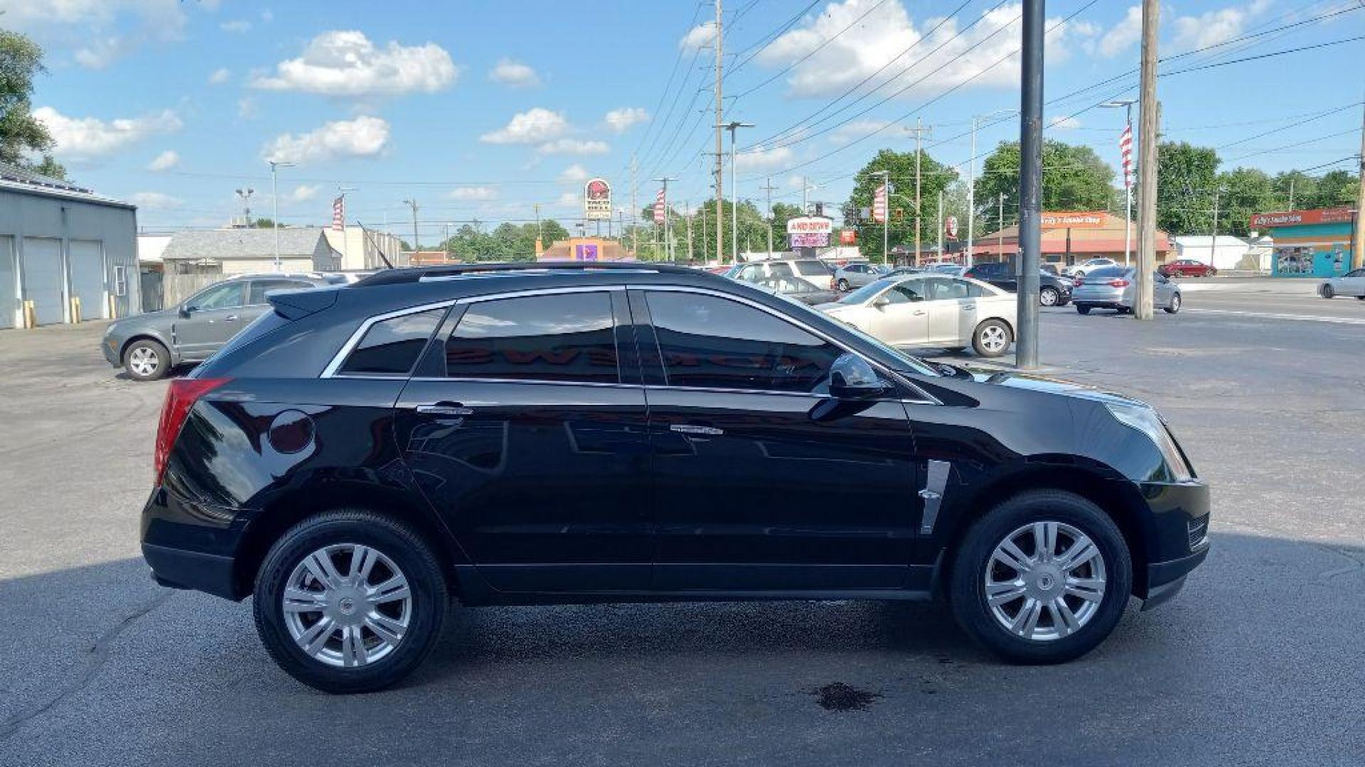 2010 BLACK CADILLAC SRX (3GYFNGEY9AS) with an 3.0L engine, Automatic transmission, located at 3100 Covert Avenue, Evansville, IN, 47714, (812) 473-4492, 37.955418, -87.512238 - Photo#2