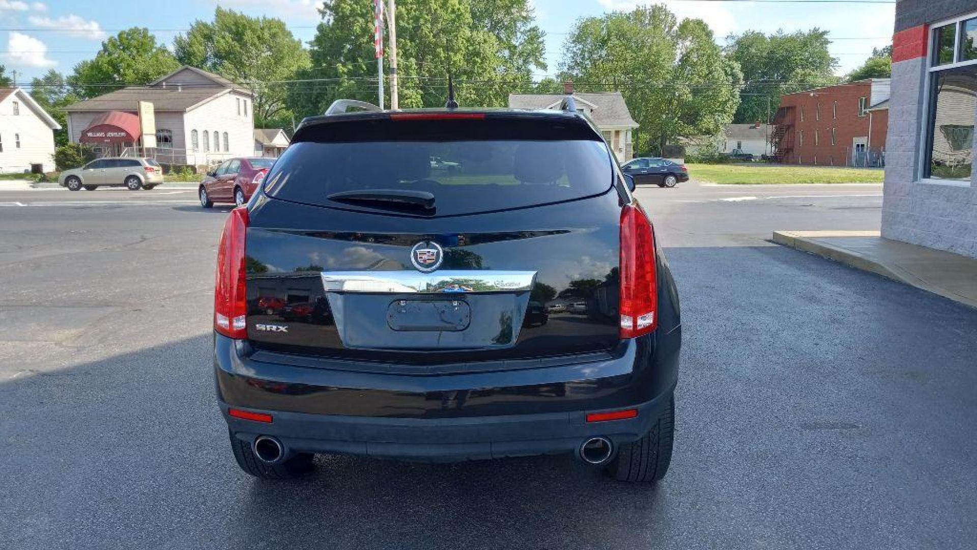 2010 BLACK CADILLAC SRX (3GYFNGEY9AS) with an 3.0L engine, Automatic transmission, located at 3100 Covert Avenue, Evansville, IN, 47714, (812) 473-4492, 37.955418, -87.512238 - Photo#3