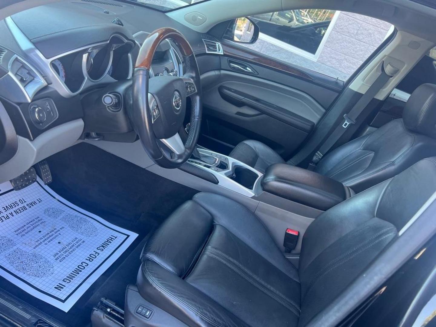 2010 BLACK CADILLAC SRX PREMIUM COLLECTION (3GYFNKE4XAS) with an 2.8L engine, Automatic transmission, located at 3100 Covert Avenue, Evansville, IN, 47714, (812) 473-4492, 37.955418, -87.512238 - Photo#2