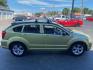 2010 GREEN DODGE CALIBER SXT (1B3CB4HA5AD) with an 2.0L engine, Automatic transmission, located at 3100 Covert Avenue, Evansville, IN, 47714, (812) 473-4492, 37.955418, -87.512238 - Photo#2