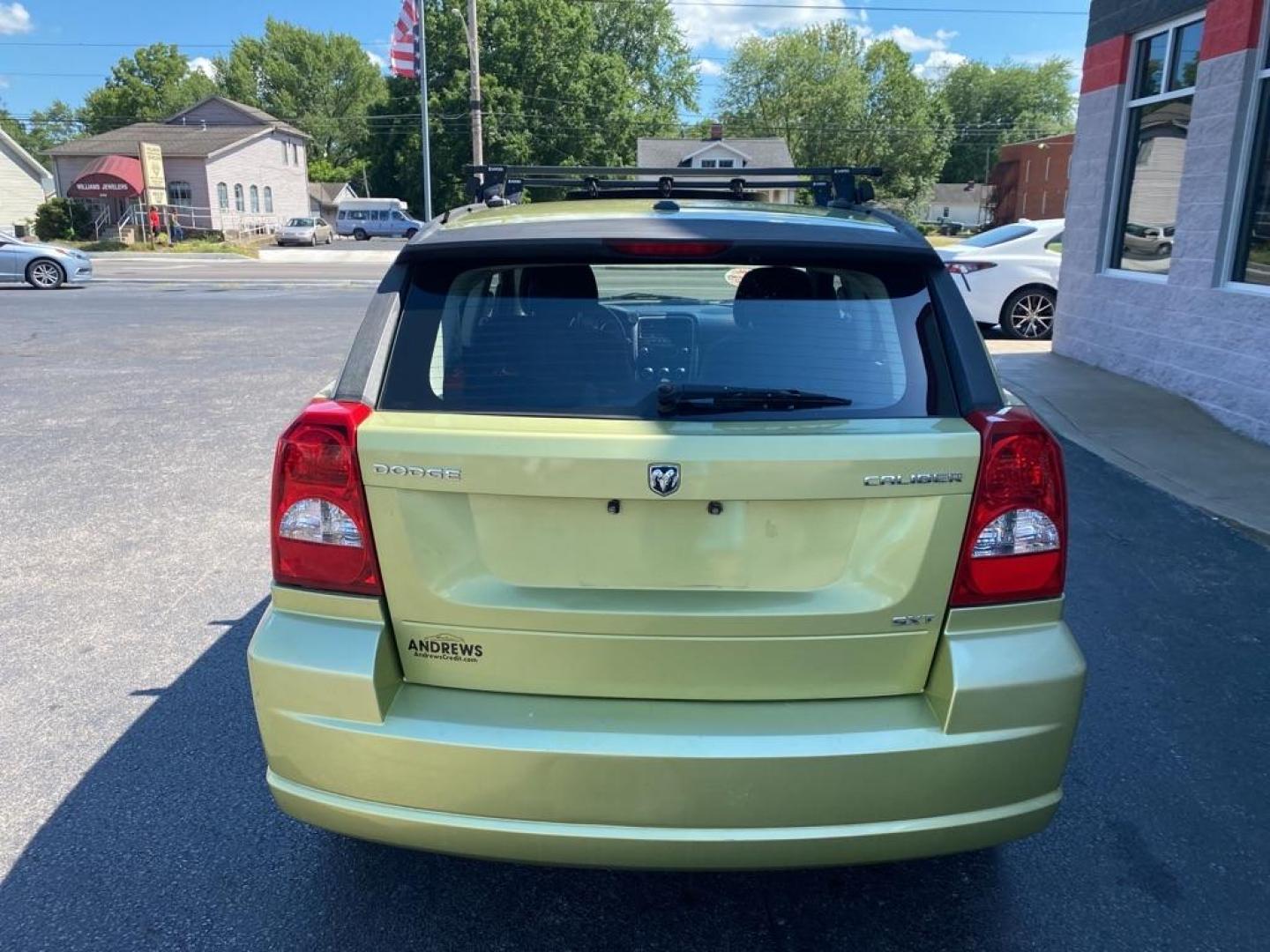 2010 GREEN DODGE CALIBER SXT (1B3CB4HA5AD) with an 2.0L engine, Automatic transmission, located at 3100 Covert Avenue, Evansville, IN, 47714, (812) 473-4492, 37.955418, -87.512238 - Photo#3