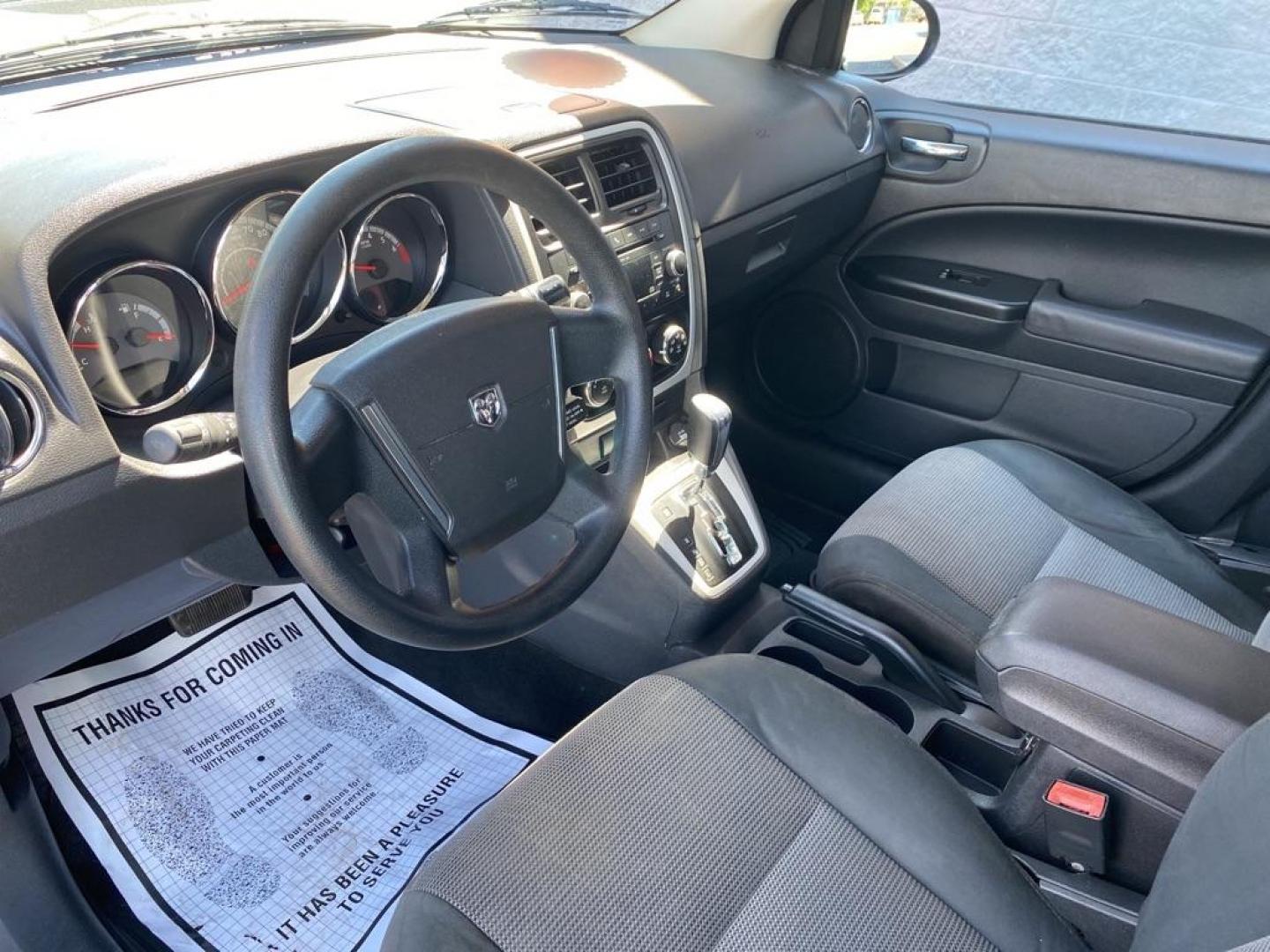 2010 GREEN DODGE CALIBER SXT (1B3CB4HA5AD) with an 2.0L engine, Automatic transmission, located at 3100 Covert Avenue, Evansville, IN, 47714, (812) 473-4492, 37.955418, -87.512238 - Photo#4