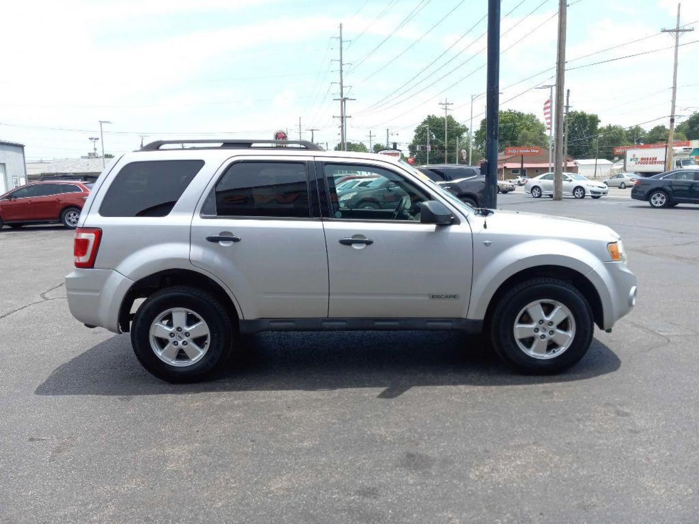 2008 SILVER FORD ESCAPE XLT (1FMCU93138K) with an 3.0L engine, Automatic transmission, located at 3100 Covert Avenue, Evansville, IN, 47714, (812) 473-4492, 37.955418, -87.512238 - Photo#2