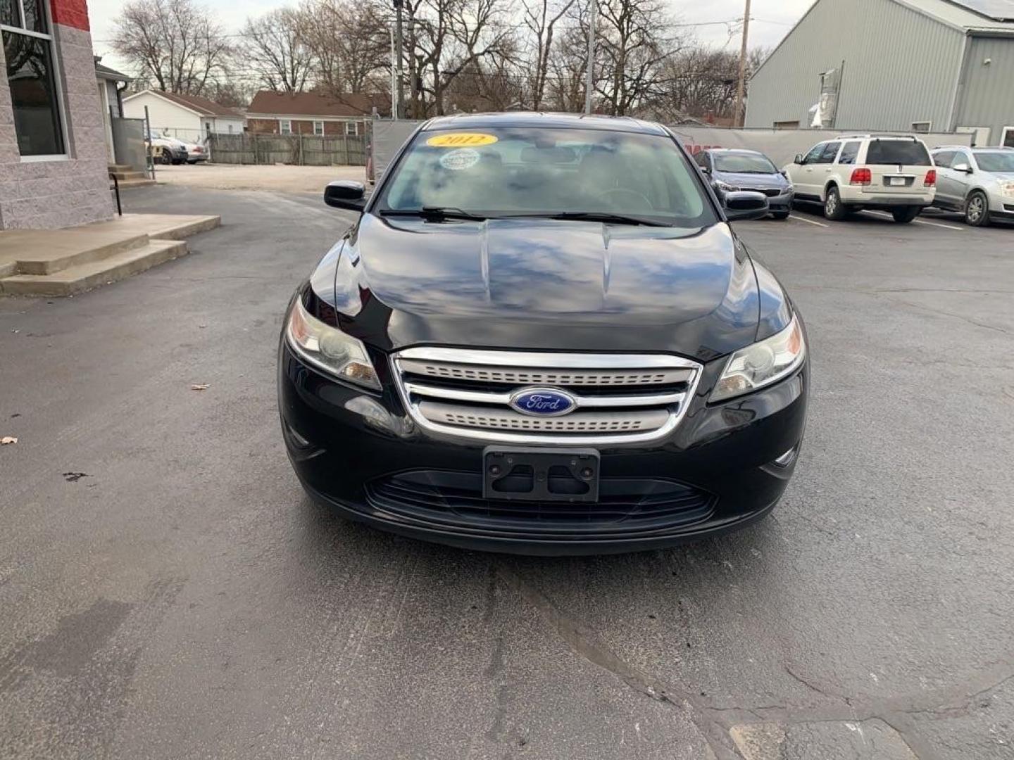 2012 BLACK FORD TAURUS SEL (1FAHP2EW4CG) with an 3.5L engine, Automatic transmission, located at 3100 Covert Avenue, Evansville, IN, 47714, (812) 473-4492, 37.955418, -87.512238 - Photo#0