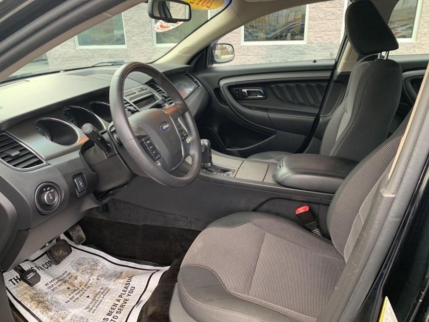 2012 BLACK FORD TAURUS SEL (1FAHP2EW4CG) with an 3.5L engine, Automatic transmission, located at 3100 Covert Avenue, Evansville, IN, 47714, (812) 473-4492, 37.955418, -87.512238 - Photo#3