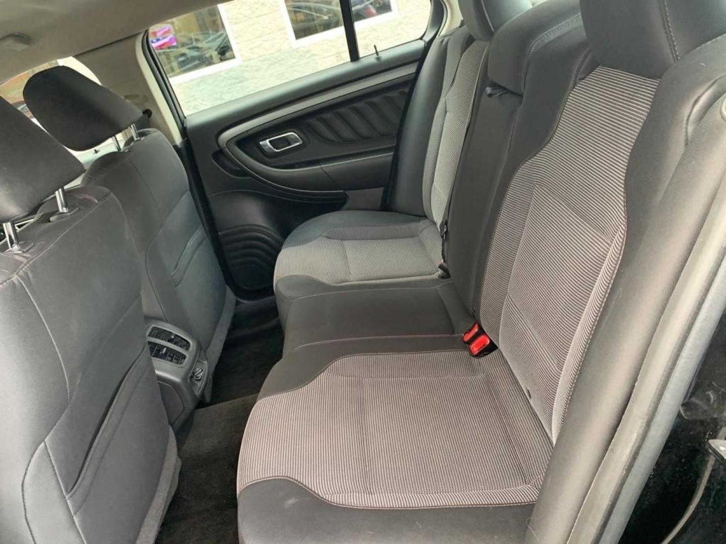 2012 BLACK FORD TAURUS SEL (1FAHP2EW4CG) with an 3.5L engine, Automatic transmission, located at 3100 Covert Avenue, Evansville, IN, 47714, (812) 473-4492, 37.955418, -87.512238 - Photo#4