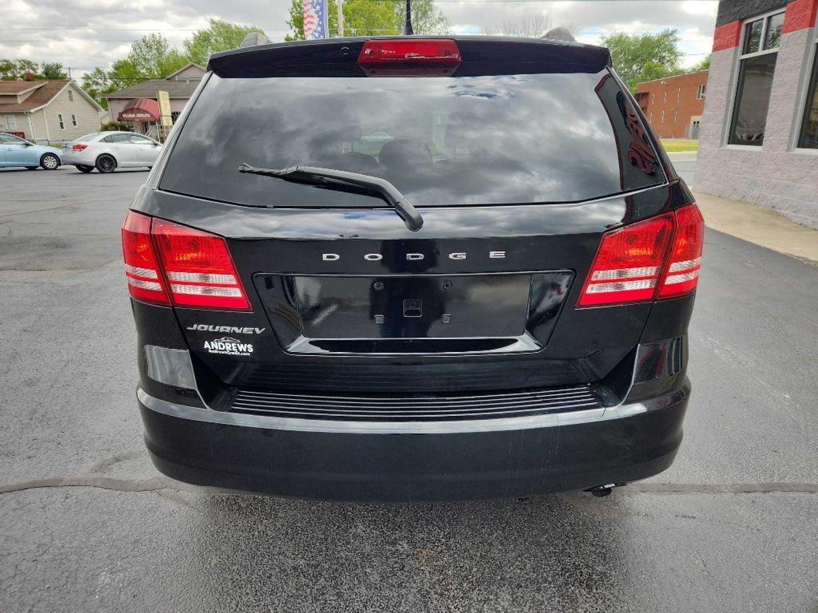 2017 BLACK DODGE JOURNEY SE (3C4PDCAB3HT) with an 2.4L engine, Automatic transmission, located at 3100 Covert Avenue, Evansville, IN, 47714, (812) 473-4492, 37.955418, -87.512238 - Photo #3