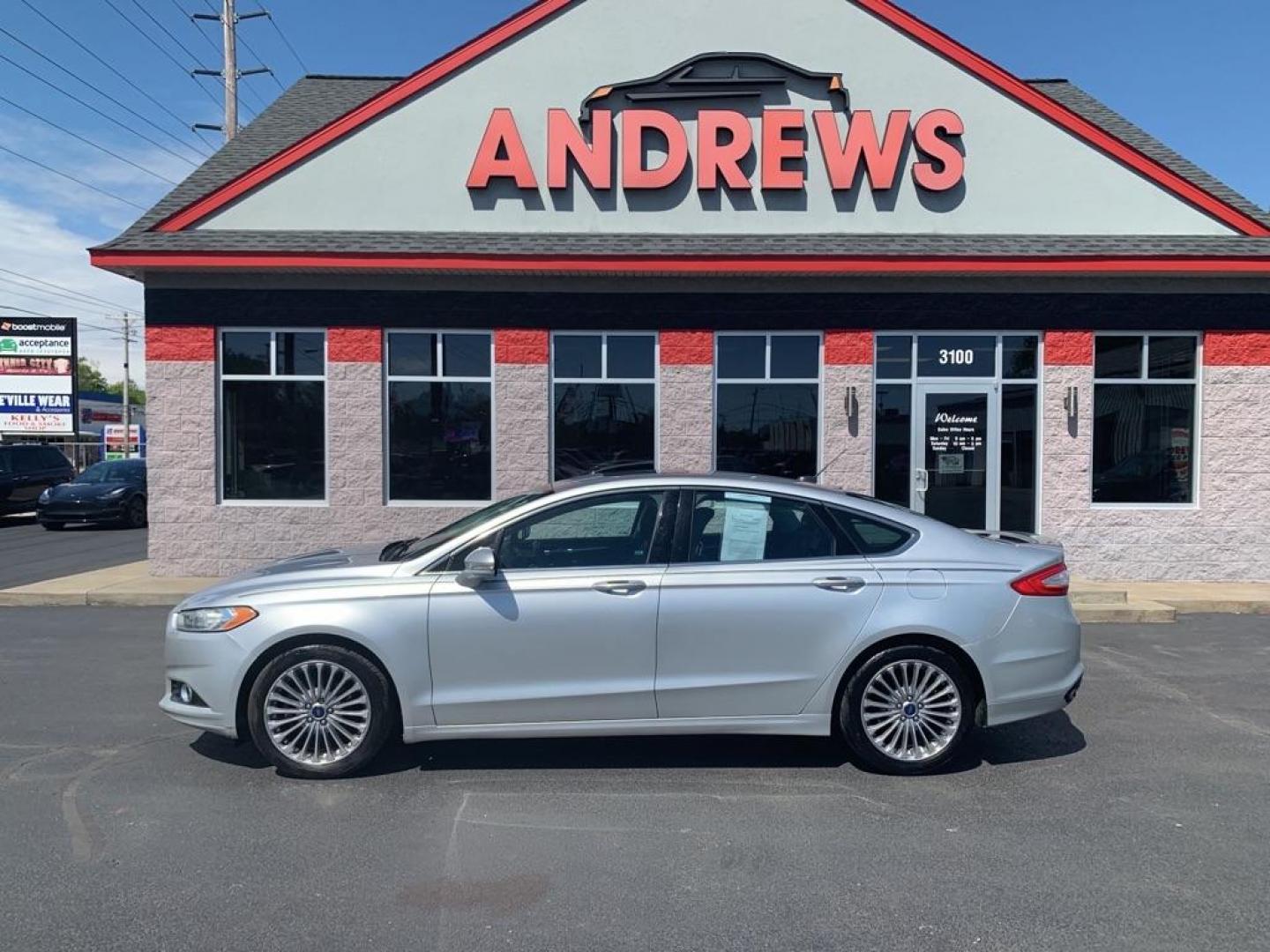 2014 SILVER FORD FUSION TITANIUM (3FA6P0K94ER) with an 2.0L engine, Automatic transmission, located at 3100 Covert Avenue, Evansville, IN, 47714, (812) 473-4492, 37.955418, -87.512238 - Photo#0