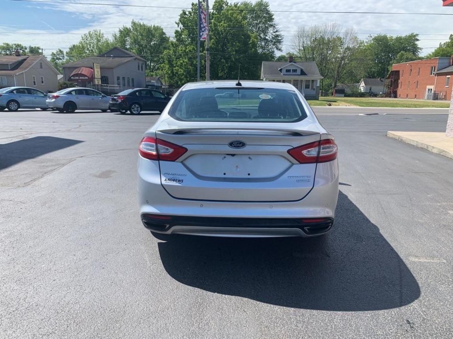2014 SILVER FORD FUSION TITANIUM (3FA6P0K94ER) with an 2.0L engine, Automatic transmission, located at 3100 Covert Avenue, Evansville, IN, 47714, (812) 473-4492, 37.955418, -87.512238 - Photo#3