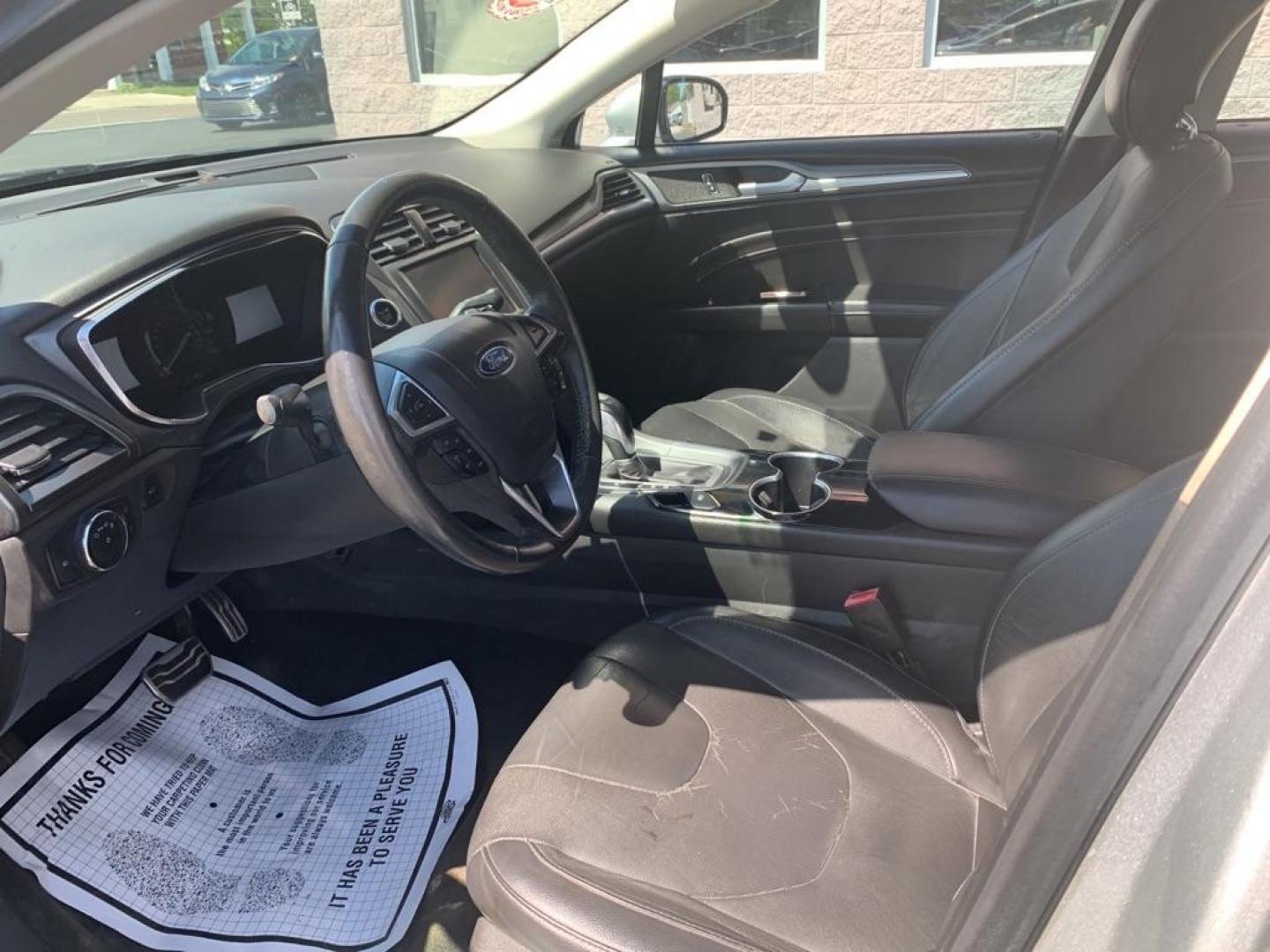 2014 SILVER FORD FUSION TITANIUM (3FA6P0K94ER) with an 2.0L engine, Automatic transmission, located at 3100 Covert Avenue, Evansville, IN, 47714, (812) 473-4492, 37.955418, -87.512238 - Photo#4