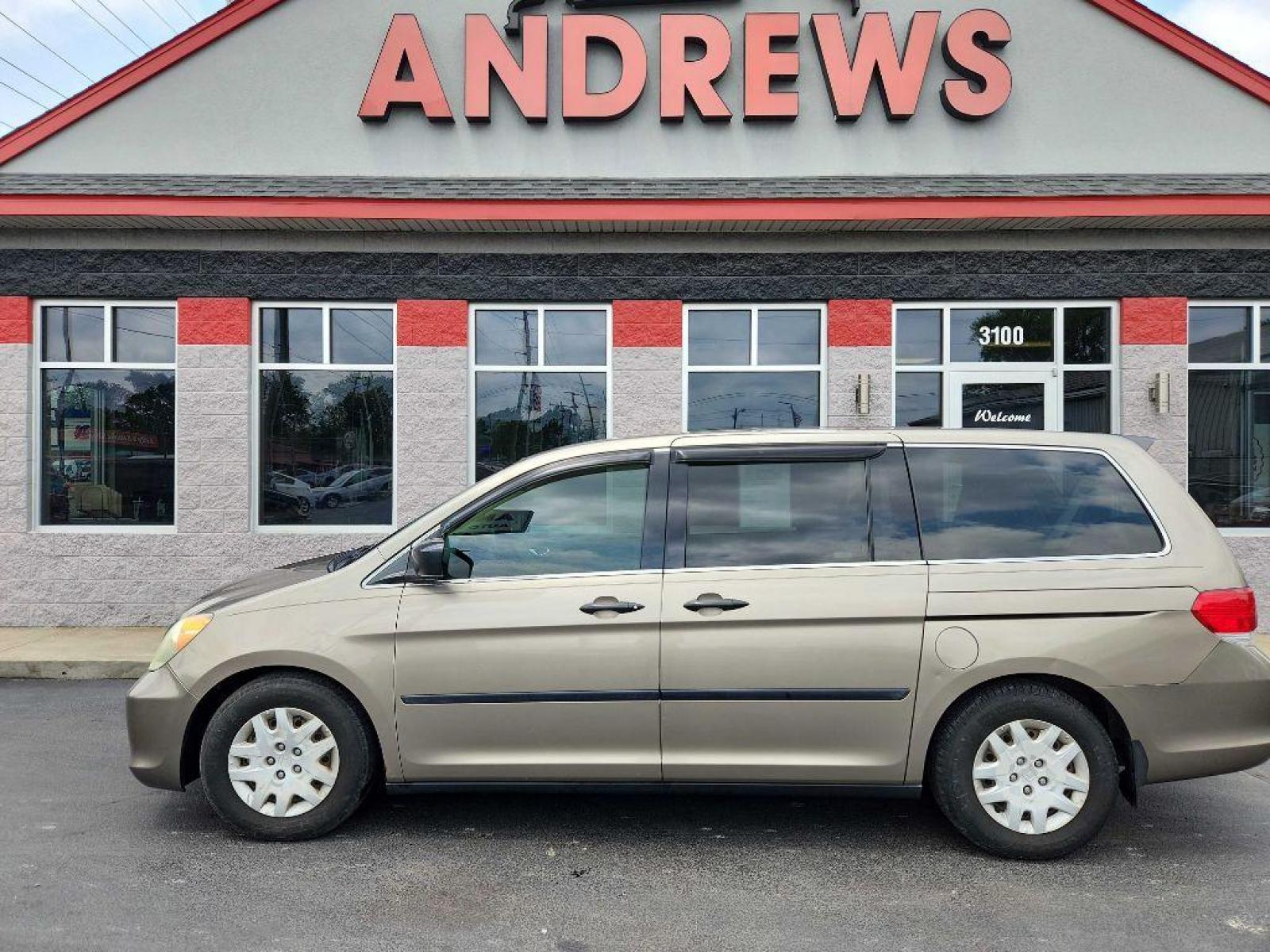 2008 GOLD HONDA ODYSSEY LX (5FNRL38278B) with an 3.5L engine, Automatic transmission, located at 3100 Covert Avenue, Evansville, IN, 47714, (812) 473-4492, 37.955418, -87.512238 - Photo #0