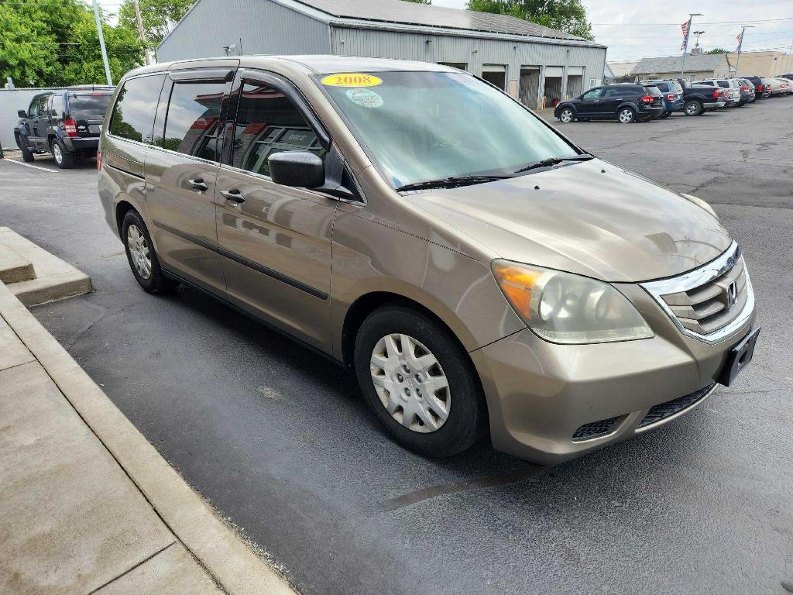 2008 GOLD HONDA ODYSSEY LX (5FNRL38278B) with an 3.5L engine, Automatic transmission, located at 3100 Covert Avenue, Evansville, IN, 47714, (812) 473-4492, 37.955418, -87.512238 - Photo #2