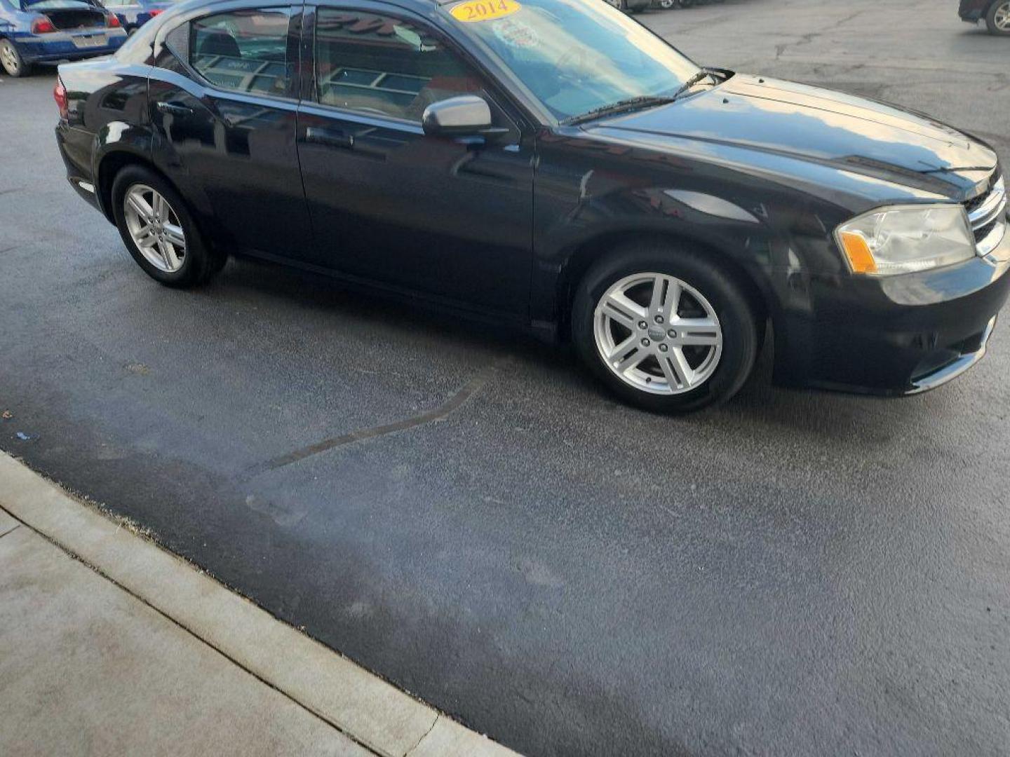 2014 BLACK DODGE AVENGER SXT (1C3CDZCB2EN) with an 2.4L engine, Automatic transmission, located at 3100 Covert Avenue, Evansville, IN, 47714, (812) 473-4492, 37.955418, -87.512238 - Photo#2