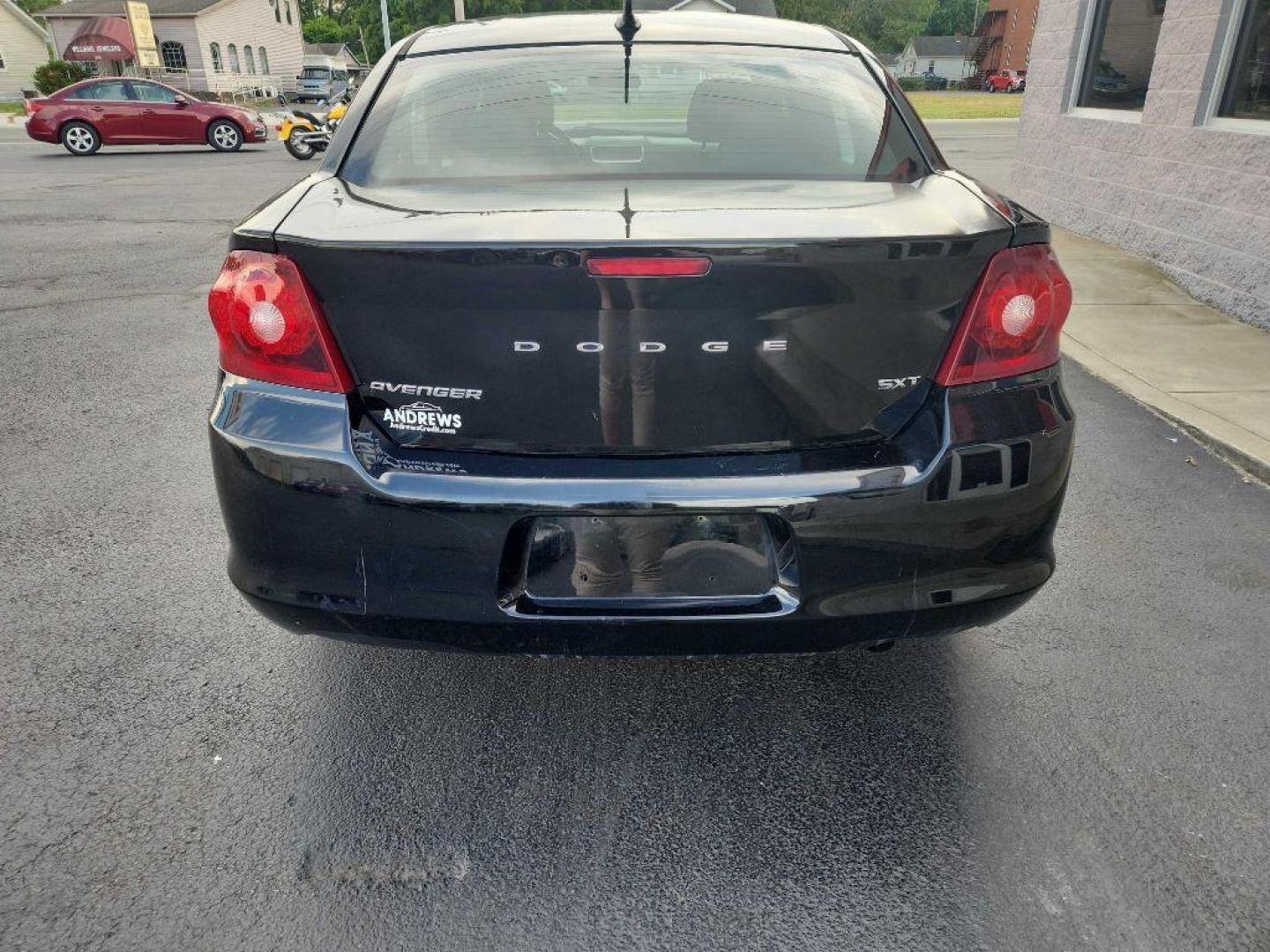 2014 BLACK DODGE AVENGER SXT (1C3CDZCB2EN) with an 2.4L engine, Automatic transmission, located at 3100 Covert Avenue, Evansville, IN, 47714, (812) 473-4492, 37.955418, -87.512238 - Photo#3