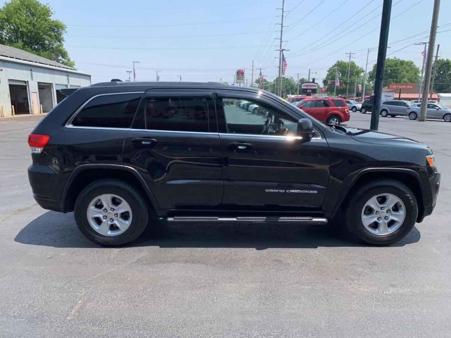 2015 BLACK JEEP GRAND CHEROKEE LAREDO (1C4RJFAG8FC) with an 3.6L engine, Automatic transmission, located at 3100 Covert Avenue, Evansville, IN, 47714, (812) 473-4492, 37.955418, -87.512238 - Photo#2