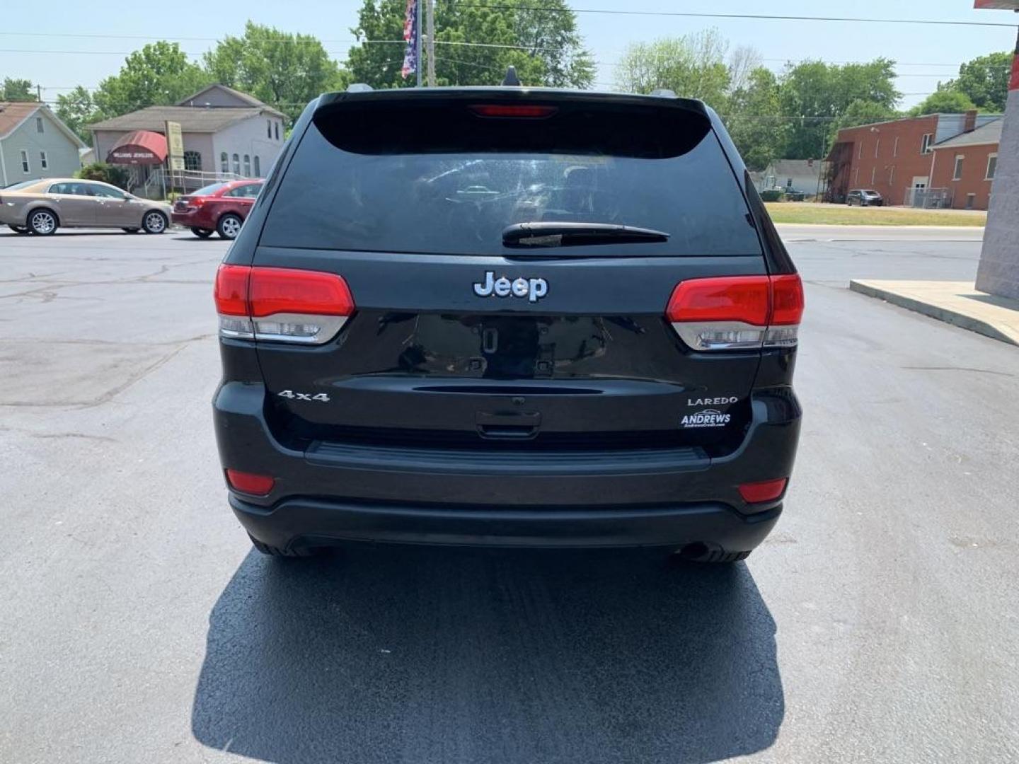 2015 BLACK JEEP GRAND CHEROKEE LAREDO (1C4RJFAG8FC) with an 3.6L engine, Automatic transmission, located at 3100 Covert Avenue, Evansville, IN, 47714, (812) 473-4492, 37.955418, -87.512238 - Photo#3
