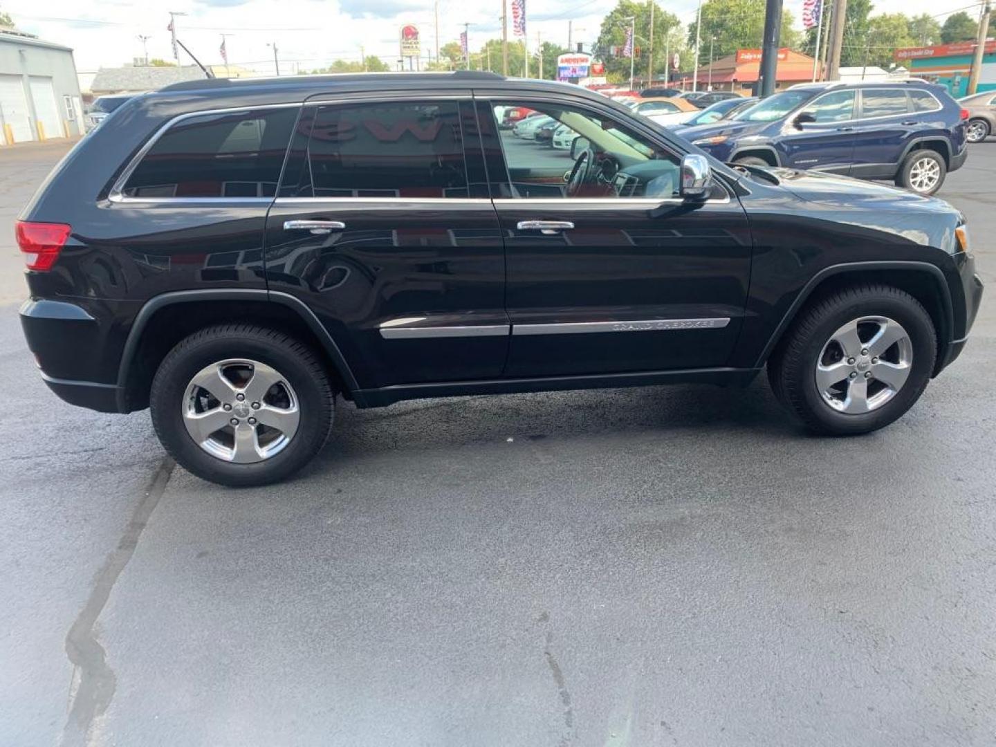 2012 BLACK JEEP GRAND CHEROKEE LIMITED (1C4RJFBGXCC) with an 3.6L engine, Automatic transmission, located at 3100 Covert Avenue, Evansville, IN, 47714, (812) 473-4492, 37.955418, -87.512238 - Photo#1