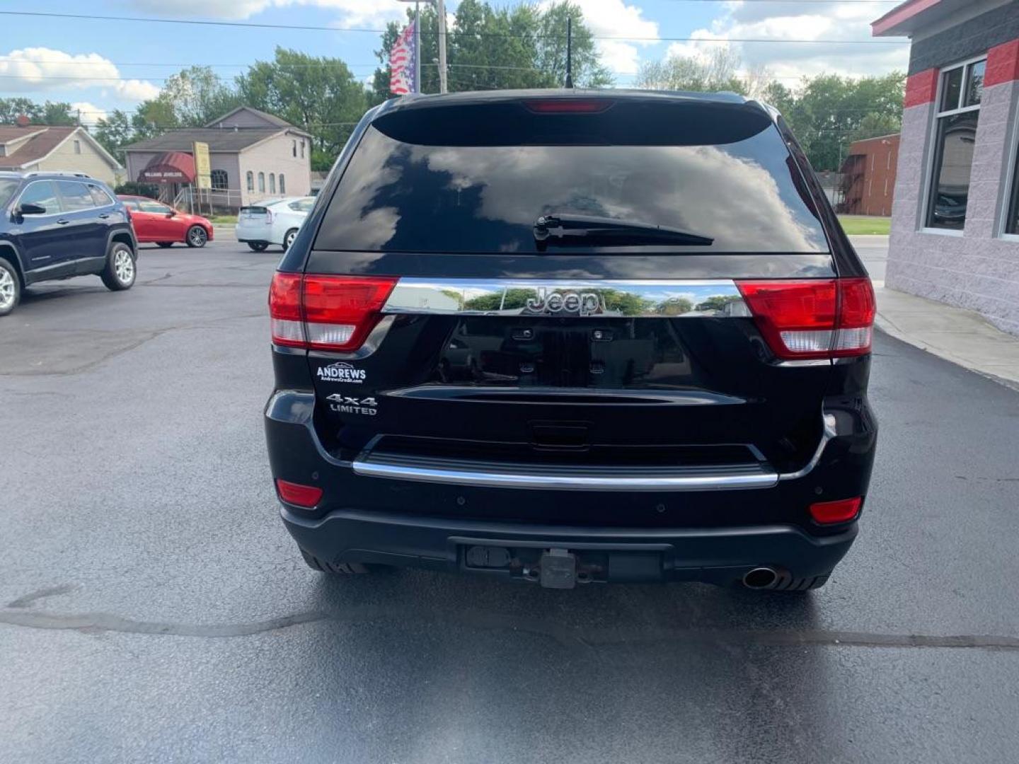 2012 BLACK JEEP GRAND CHEROKEE LIMITED (1C4RJFBGXCC) with an 3.6L engine, Automatic transmission, located at 3100 Covert Avenue, Evansville, IN, 47714, (812) 473-4492, 37.955418, -87.512238 - Photo#3