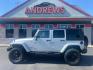 2009 SILVER JEEP WRANGLER UNLIMI SAHARA (1J8GA59159L) with an 3.8L engine, Automatic transmission, located at 3100 Covert Avenue, Evansville, IN, 47714, (812) 473-4492, 37.955418, -87.512238 - Photo#0