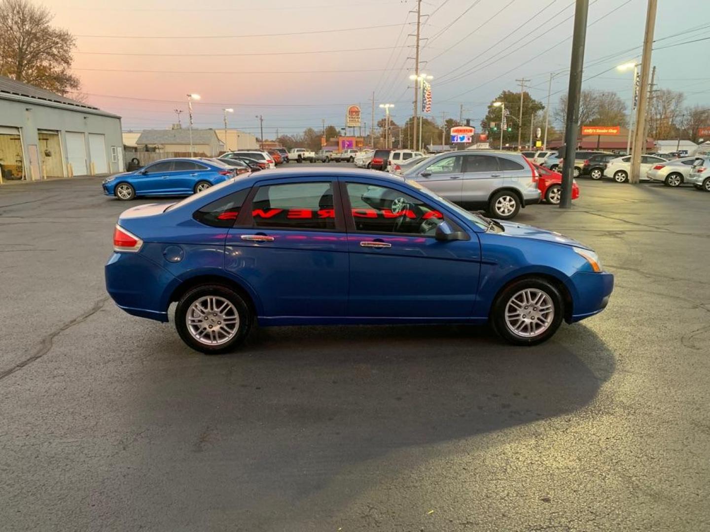 2011 BLUE FORD FOCUS SE (1FAHP3FN8BW) with an 2.0L engine, Automatic transmission, located at 3100 Covert Avenue, Evansville, IN, 47714, (812) 473-4492, 37.955418, -87.512238 - Photo#2